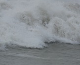 Foam from large wave at Isla Blanca Park jetty (click to enlarge)