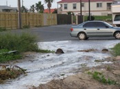 Water surging through private beach access point on Gulf Boulevard, SPI (click to enlarge)