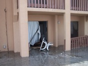 Apparent flood damage at first floor of resort on SPI (click to enlarge)