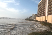 View down SPI resort area showing tides fully into dunes (click to enlarge)