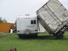 Trailer turned onto side of recreational vehicle by small tornado, San Pedro, June 30 2010 (click to enlarge)