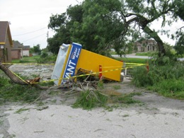 Water kiosk turned on side by small tornado, San Pedro (click to enlarge)