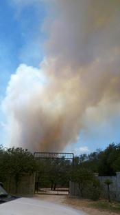 Entrance to the SMAC Ranch with billowing smoke, June 18th 2011 (click to enlarge)