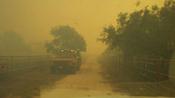 Entrance to the SMAC Ranch with billowing smoke, June 18th 2011 (click to enlarge)