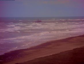Rough and tumble surf near the Isla Blanca Jetty (north) on South Padre Island during the afternoon of Friday, September 26 2014