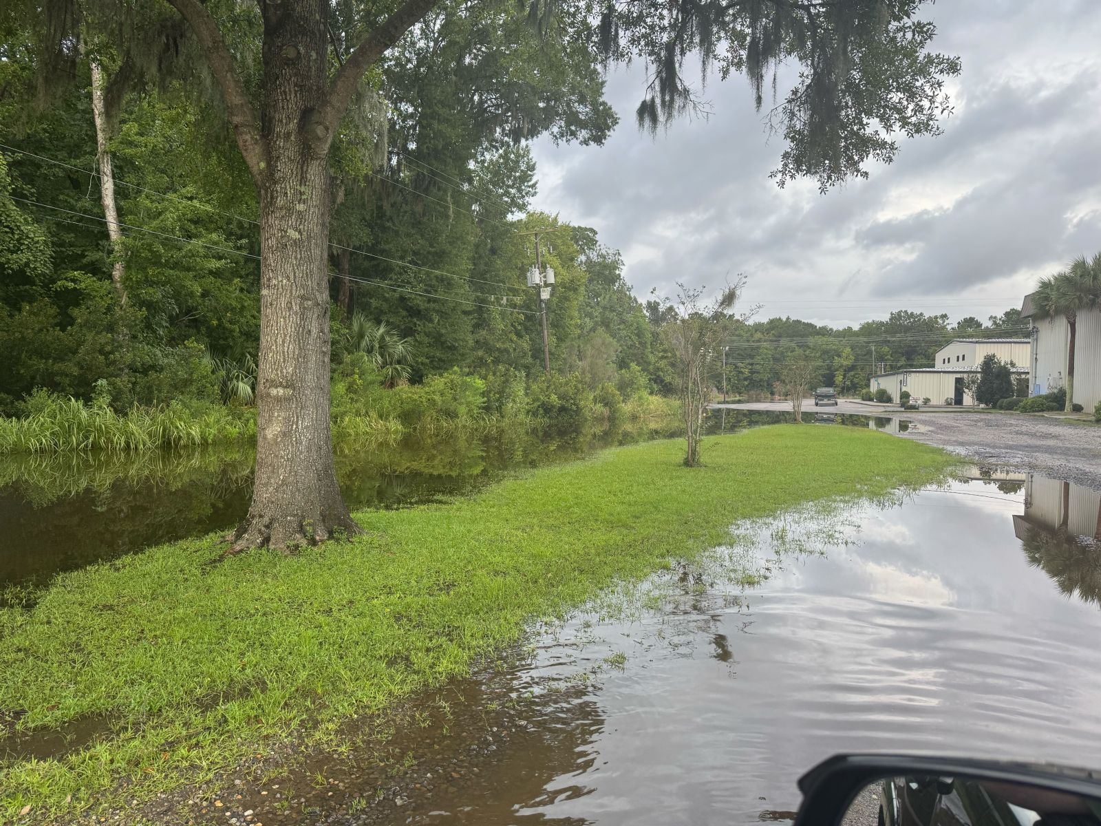 Image of flooding along the banks of Church Creek in West Ashley, SC.
