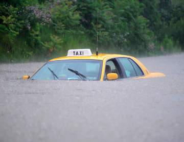 car submerged in flood waters