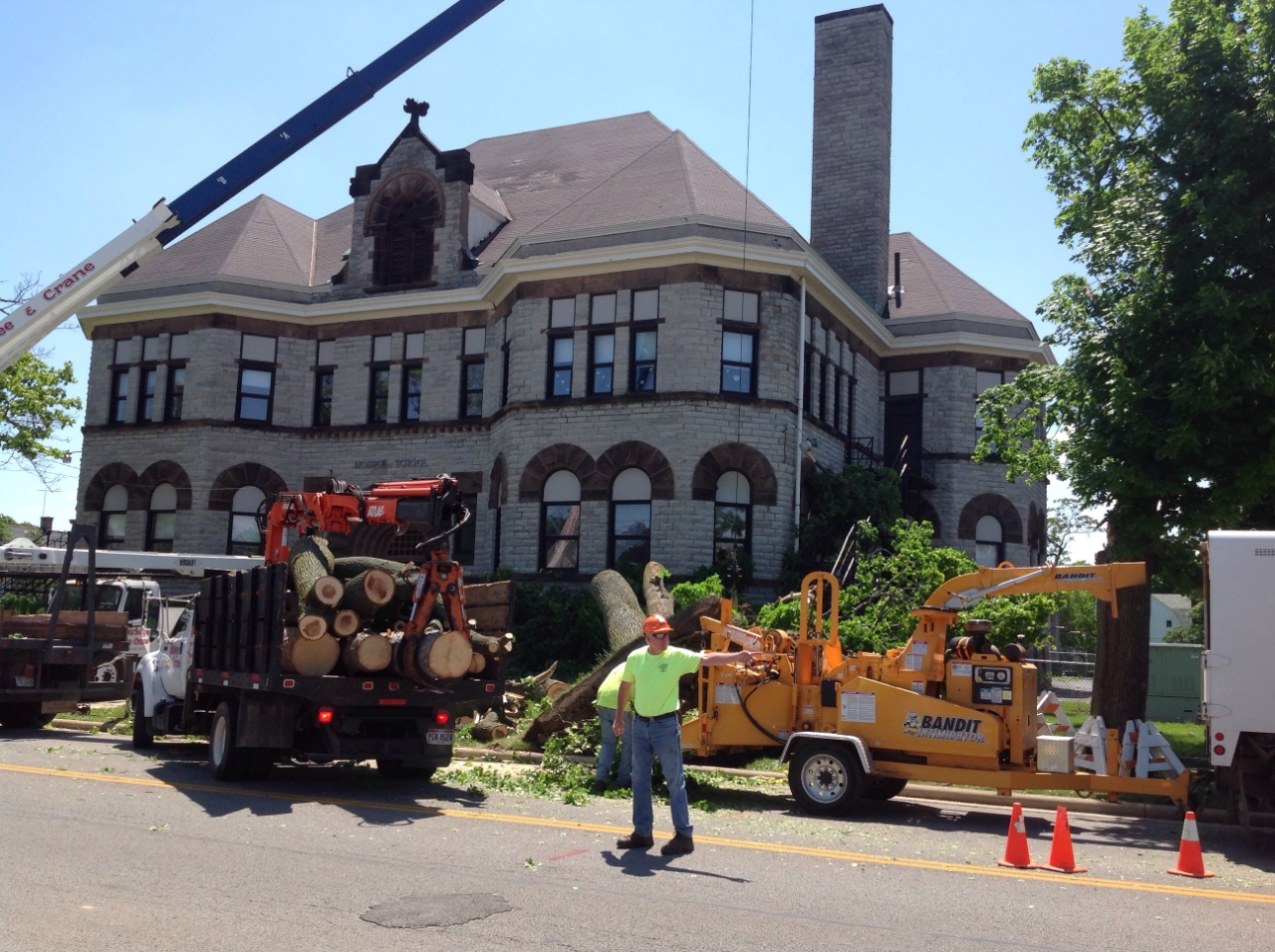 Crew cleaning up trees in Sandusky