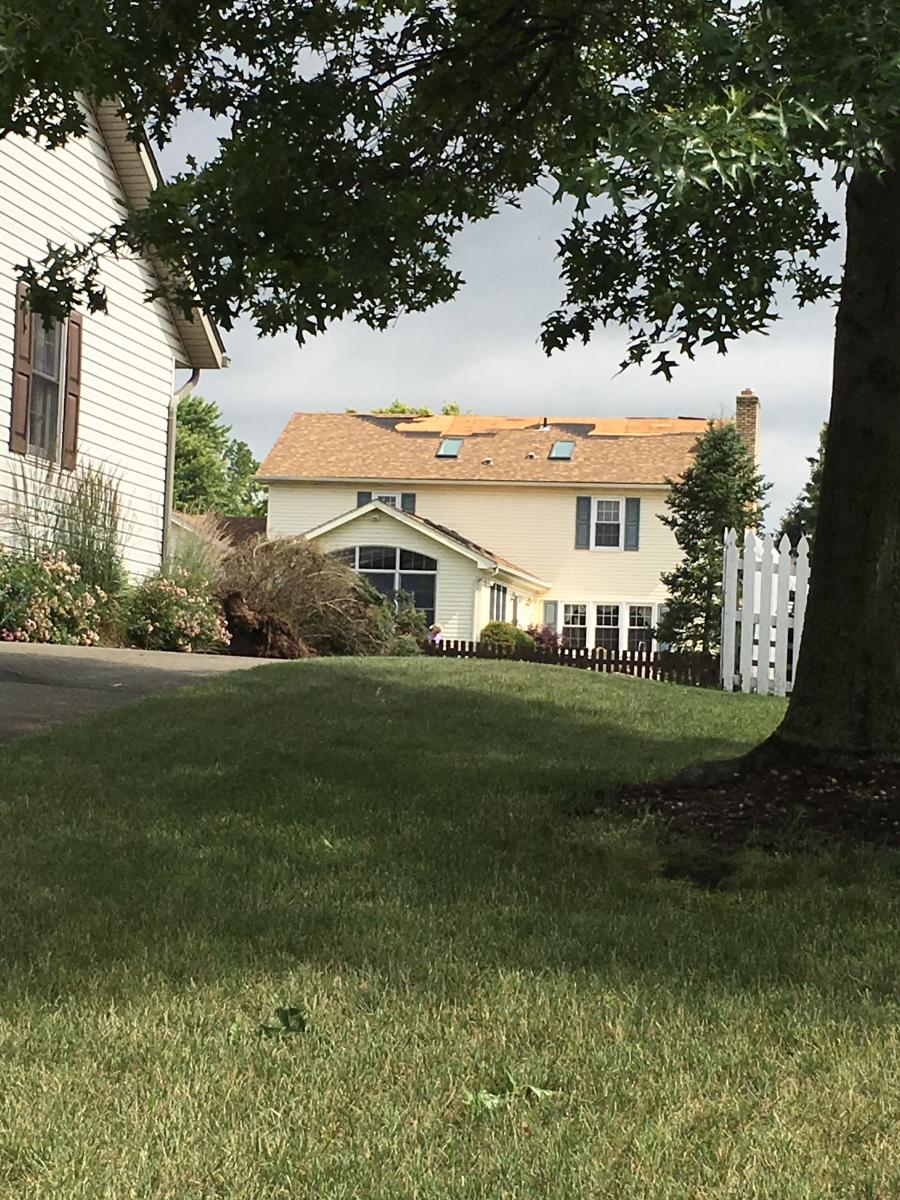 Photo of a damaged home in Plain Township, Stark County, Ohio.