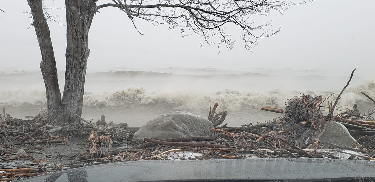 Shoreline debris and high waves at Freeport Beach in North East PA