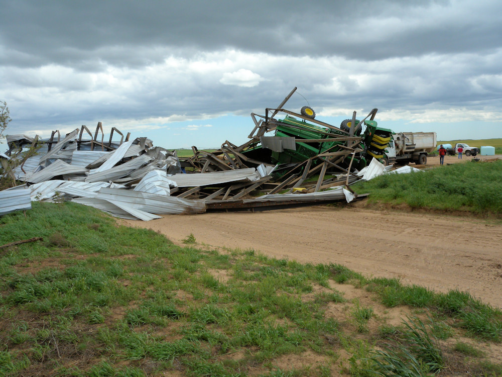 A large shed was destroyed and cotton pickers rolled in Edwards county
