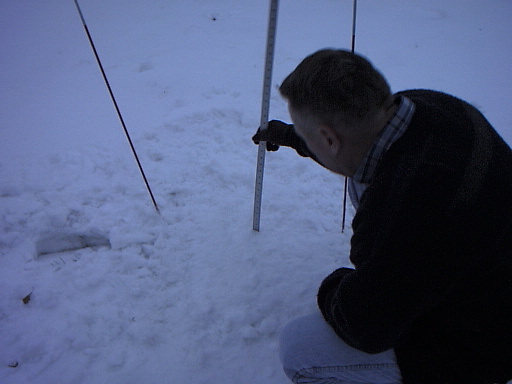 Measuring snow on a snow board