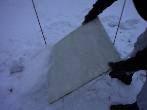 Clearing the snow board