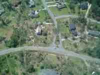 [ Aerial photo of damage along Governor MacDonald - Pineworth Rd. ]