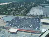 [ Aerial photo of damage to a Home Depot store. ]