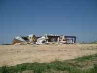 [ Metal building destroyed in Johnson County. ]