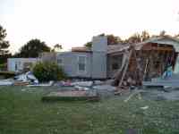 [ Home damaged on Buckeye Rd. ]