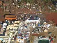 [ aerial view - close-up of home destroyed ]
