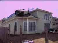 [ Damage to home in Ashland subdivision. ]