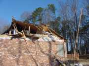 [ damaged house in River Oaks Subdivision ]