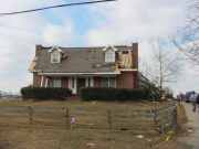 [ damaged house along HWY 74 just north of Tyrone ]