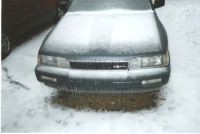 [ ice-covered car ]