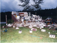 [ damage to a home by tornado spawned by Ivan ]