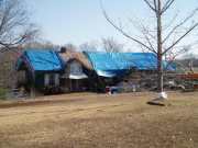 [ Damaged house on HWY 11 ]