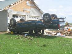 [ Rolled vehicle at another poultry farm east of Roopville ]