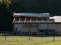 [ barn roof peeled back ]