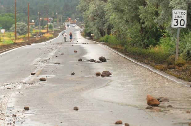 Rocks were left on area roads after flood waters receded.