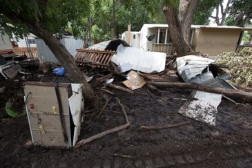 The Stagecoach mobile home park in Mayer sustained significant damage from the flood waters with several homes lost.