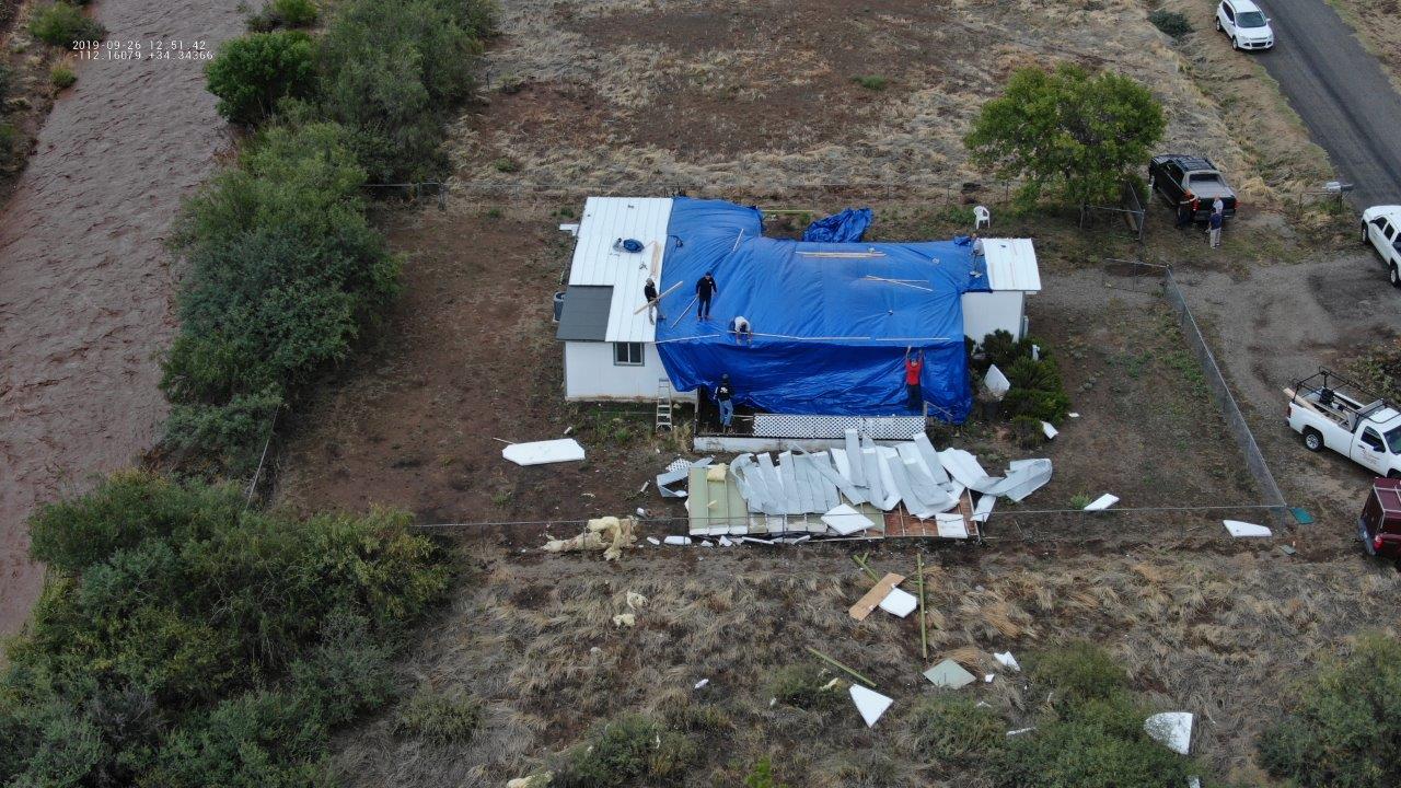 Arial photo of damaged mobile home. Courtesy of Yavapai County Development Services