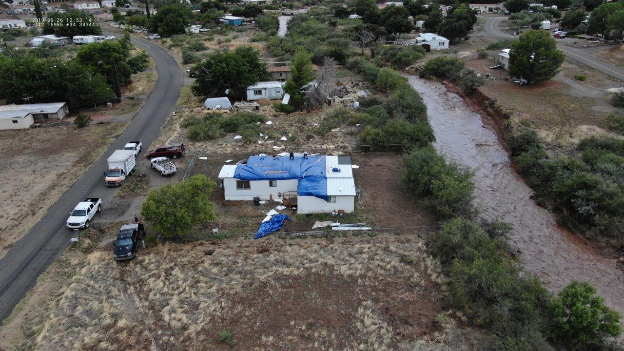 Arial photo of damaged mobile home. Courtesy of Yavapai County Development Services