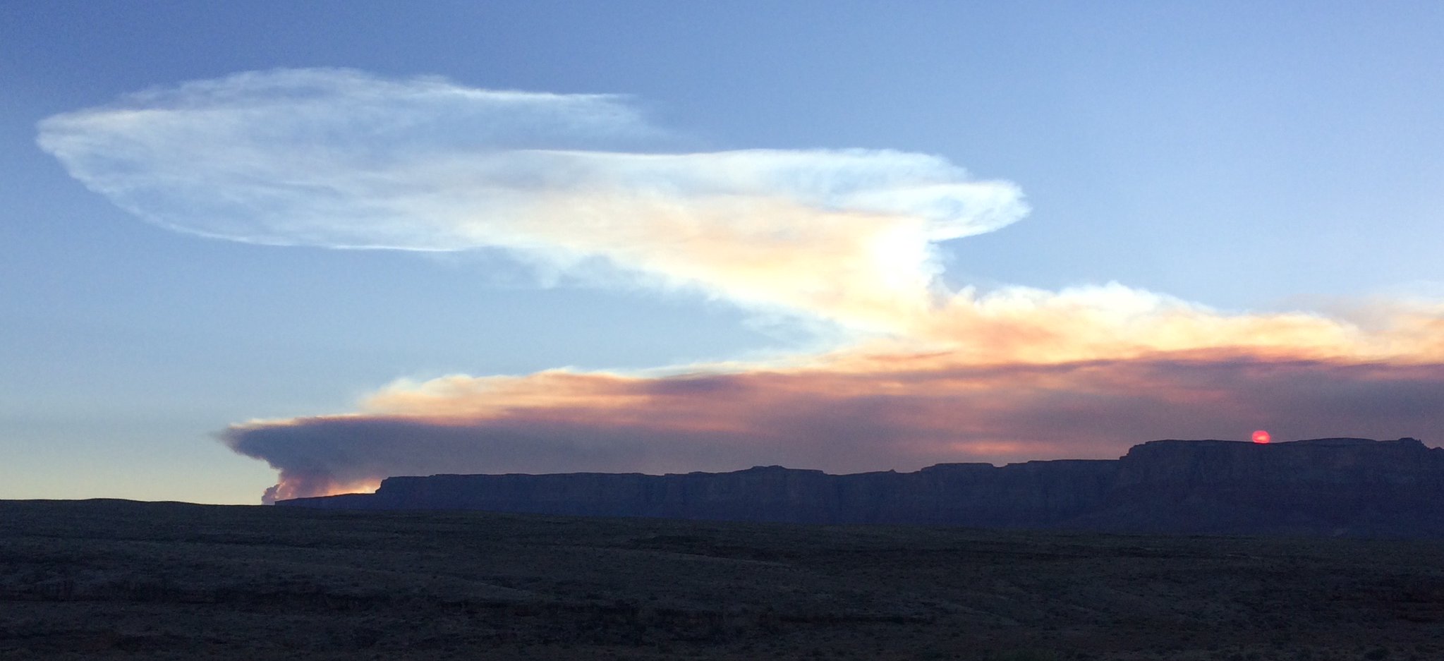 Sun rises behind smoke produced from Mangum Fire June 12, 2020. Photo Credit: Kaibab National Forest