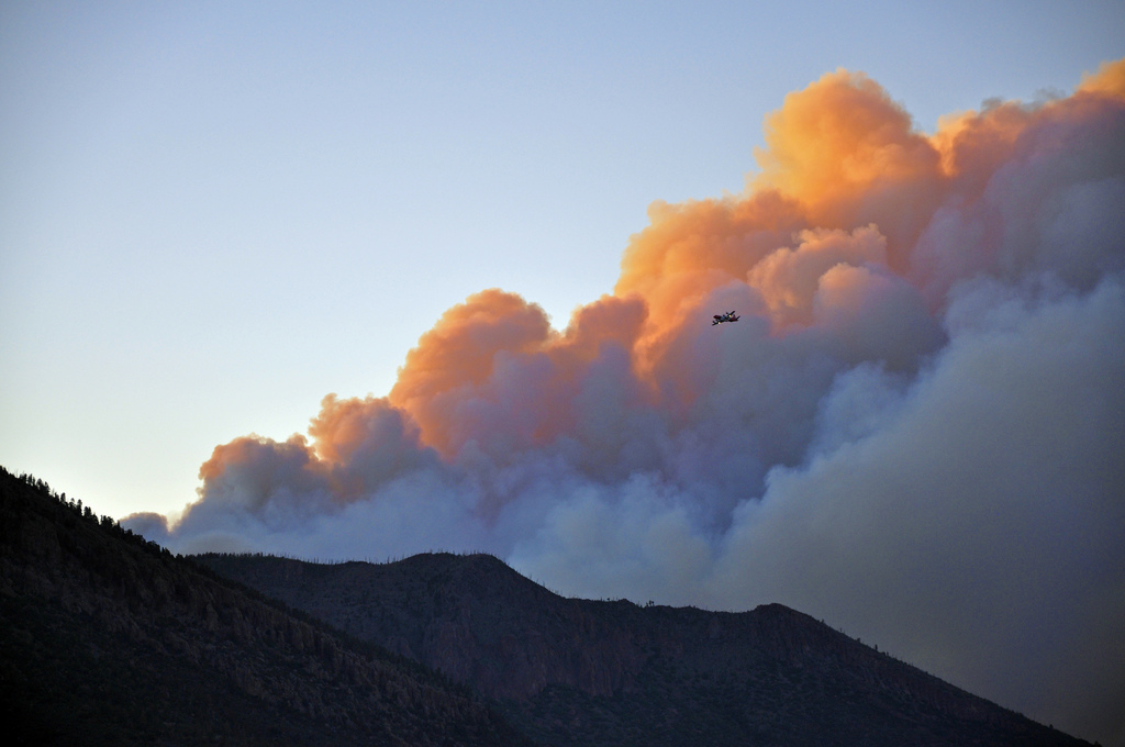 Air tanker flying in front of the smoke of the Schultz Fire. Photo credit: USDA Forest Service, Coconino National Forest