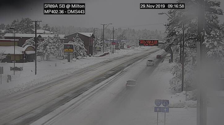 Snow covered Milton Rd in Flagstaff mid-morning Friday. Photo Credit: ADOT