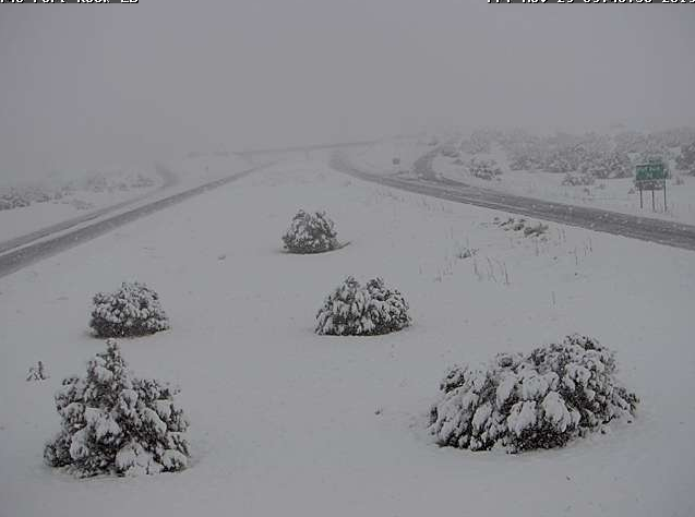 Heavy snowfall and low visibility on Interstate 40 between Kingman and Seligman Friday morning. Photo Credit: ADOT