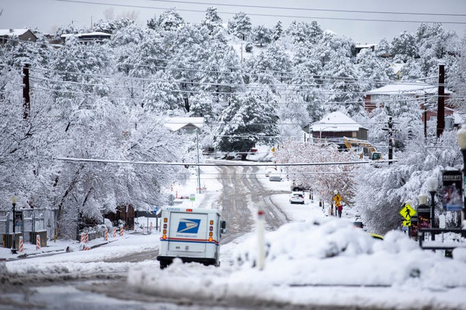 Prescott saw several inches of snow leading to hazardous travel conditions. Photo Credit: The Republic