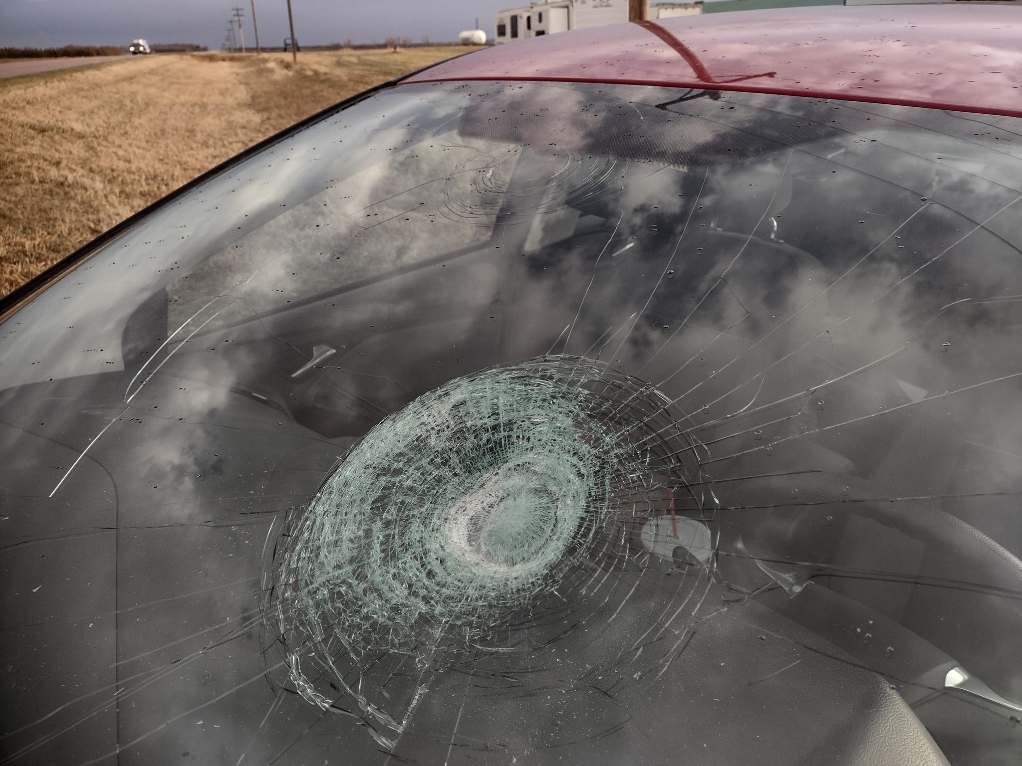 Hail damaged car windshield Clayton SD