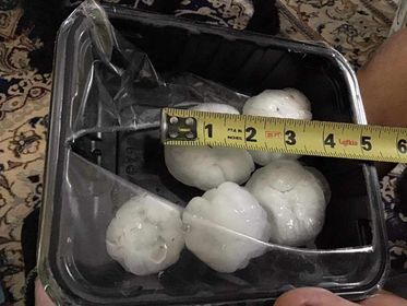 Photo of up to 2 inch hail in Lake Benton, Minnesota.