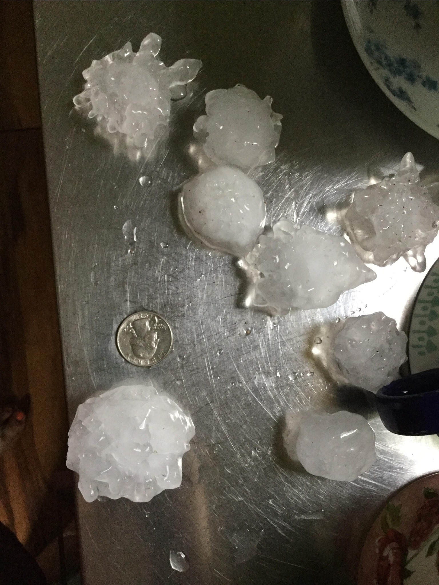 Photo of up to 2 inch hail near the South Dakota and Minnesota border on Highway 34.