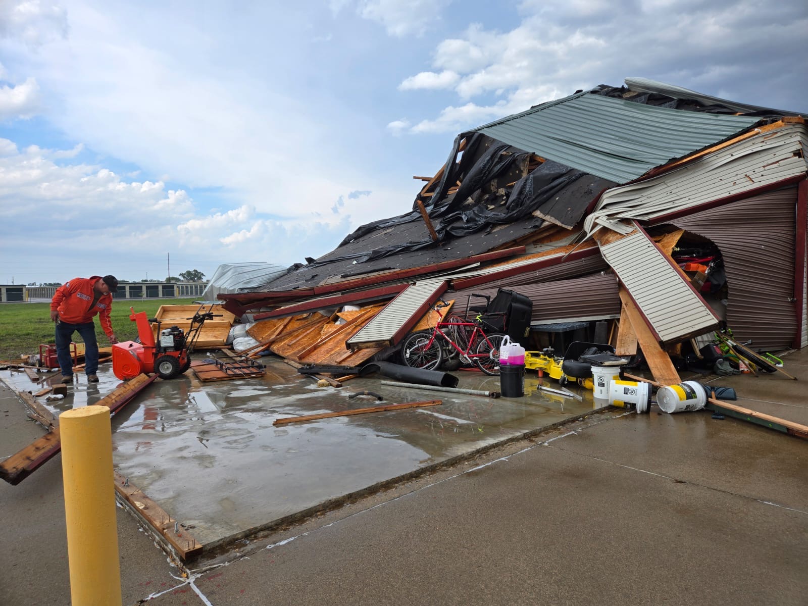 Thunderstorm Wind Damage North Side of Vermillion. Photo shows a storage facility that has collapsed and shifted off its slab foundation. 