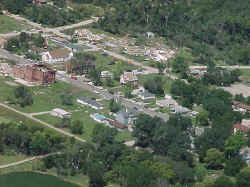 Aerial view of damage in town.