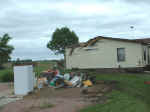 Garage and trailer home damage in southeast Centerville.