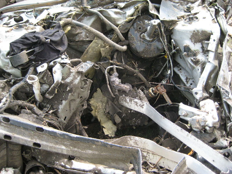 Picture of the front of the car showing the engine block missing.
