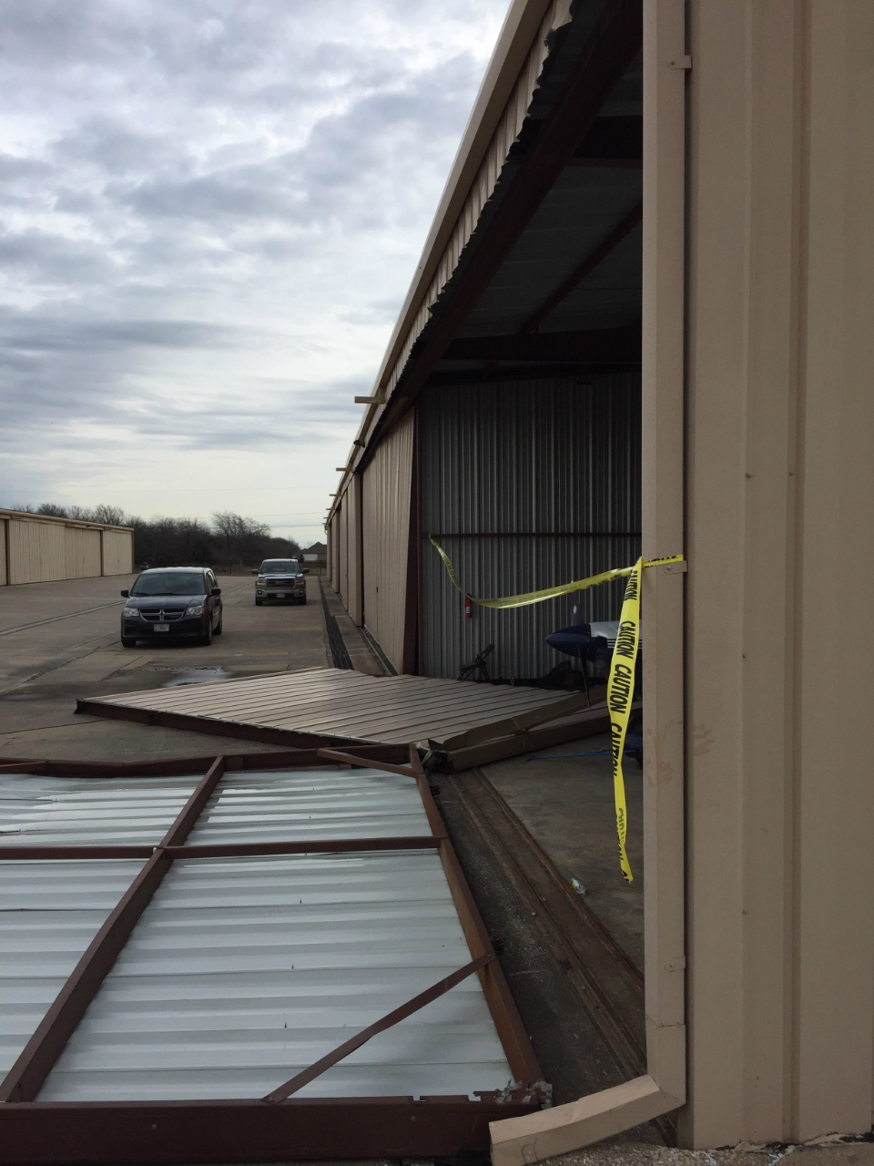 Wind damage at Grand Prairie Municipal Airport (estimated 80 mph)