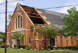 Picture of tornado damage to a chruch.