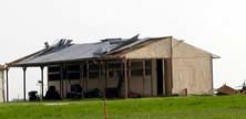 Picture of roof damage north of Mayperl.