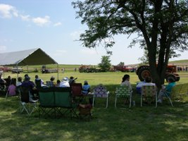 Spectators at the Old Fashioned Wheat Harvest at Clifford Roach's Farm on July 9, 2011.